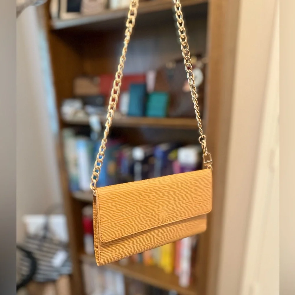 Pre-loved Authentic Louis Vuitton Tan Epi Leather Clutch - Picture 2 of 14
